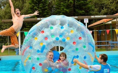 Bradley Hunt takes the plunge into Woolgoolga Pool as his sister, Kelsie, and Conor and Lilly Gleeson join their dad, Pat, playing with the new Aqua Bubble. Bradley Hunt takes the plunge into Woolgoolga Pool as his sister, Kelsie, and Conor and Lilly Gleeson join their dad, Pat, playing with the new Aqua Bubble.
